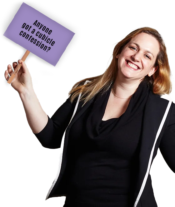 Maya Kadar Kovalsky is smiling and holding a sign that says “Anyone got a cubicle confession?” — inviting users to share a workplace story.